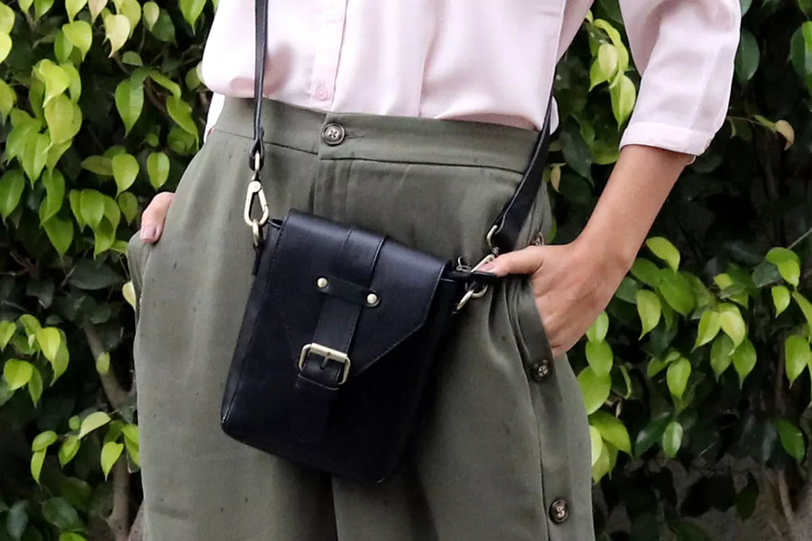 girl_with_black_leather_crossbody_sling_bags